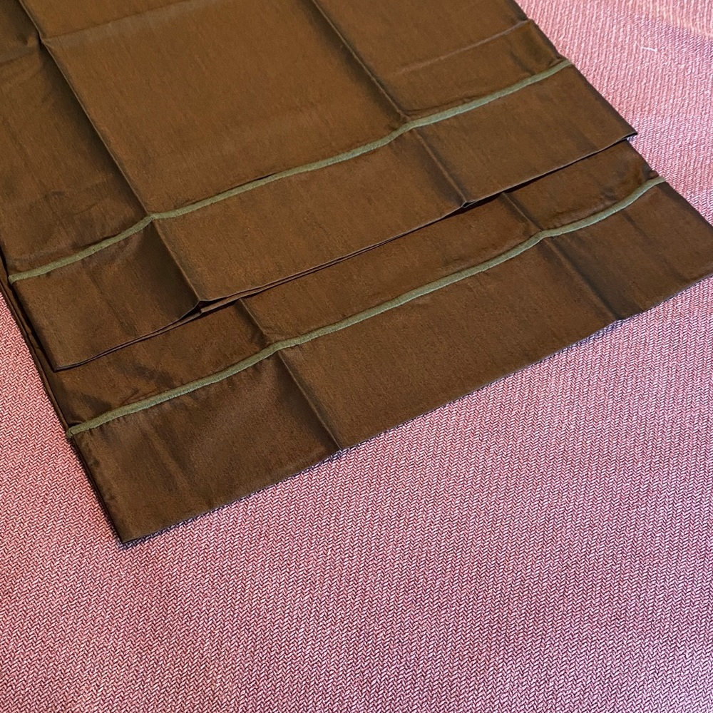 Two standard bag top pillow cases. Brown with matching stitching.